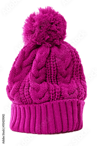 One single pink or purple winter bobble ski knit hat isolated on white background winter clothes