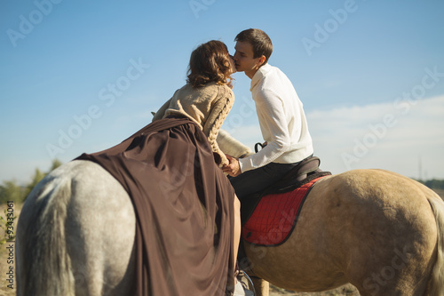 Romantic couple riding 