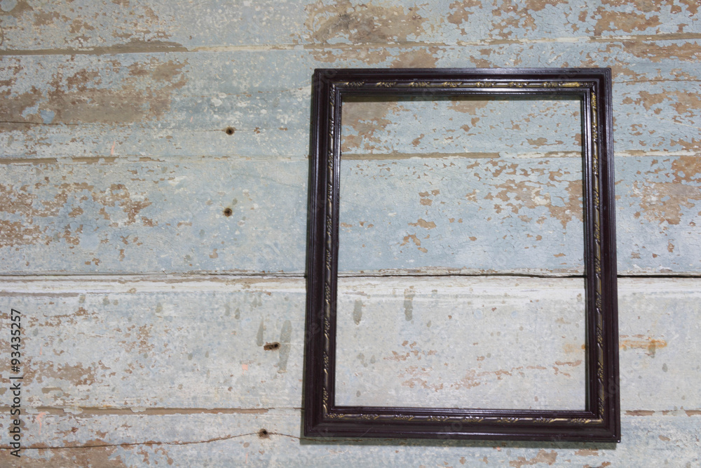 Classic wooden frame on old wooden background