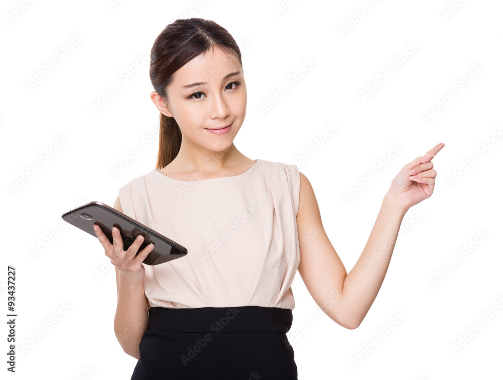 Asian businesswoman hold with tablet and finger point up Asian businesswoman hold with tablet and finger point up
