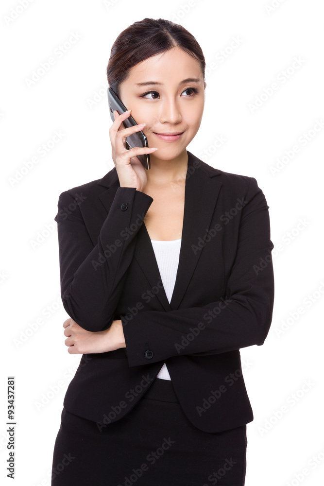 Asian businesswoman talk to mobile phone Asian businesswoman talk to mobile phone