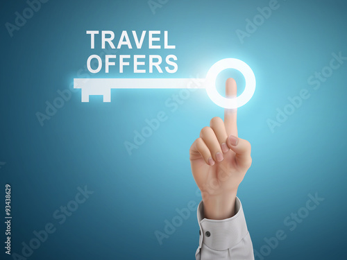 male hand pressing travel offers key button