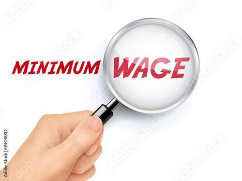minimum wage words showing through magnifying glass