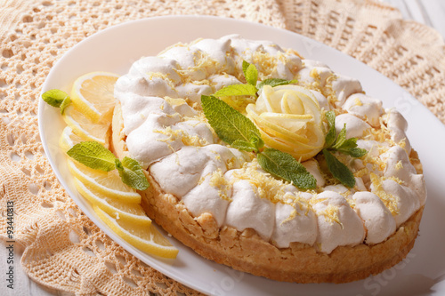 Delicious lemon tart with meringue close-up. horizontal 