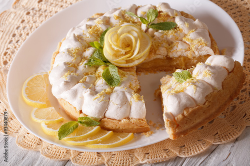 sliced lemon meringue pie close-up on the table. horizontal 