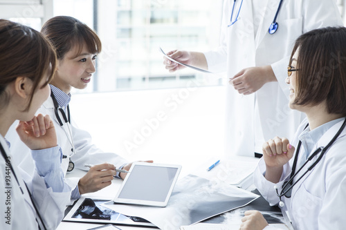 Doctors have a meeting with the tablet photo