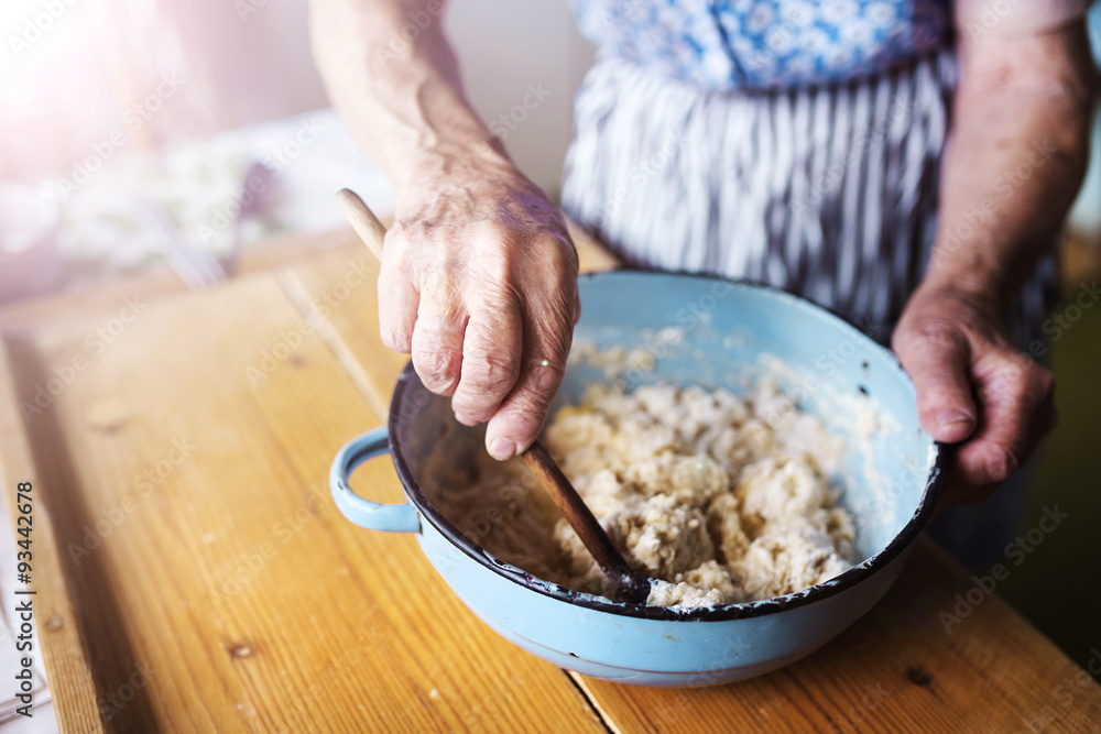 Fototapeta premium Senior woman baking 