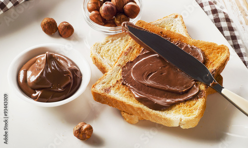 Fotografi Toast with chocolate spread for a sweet breakfast
