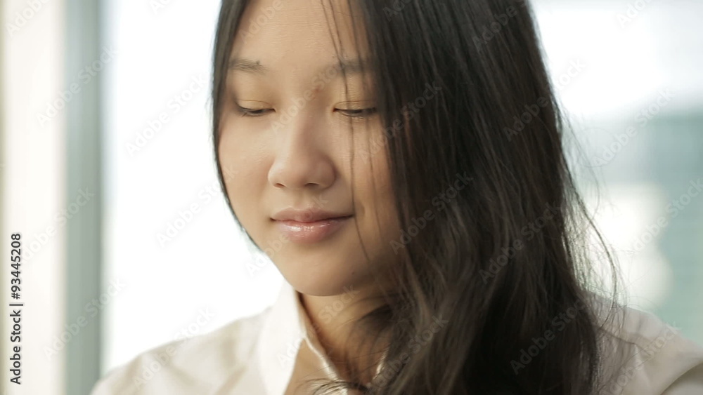 young Asian Business woman at office with laptop, typing, Dolly young Asian Business woman at office with laptop, typing, Dolly