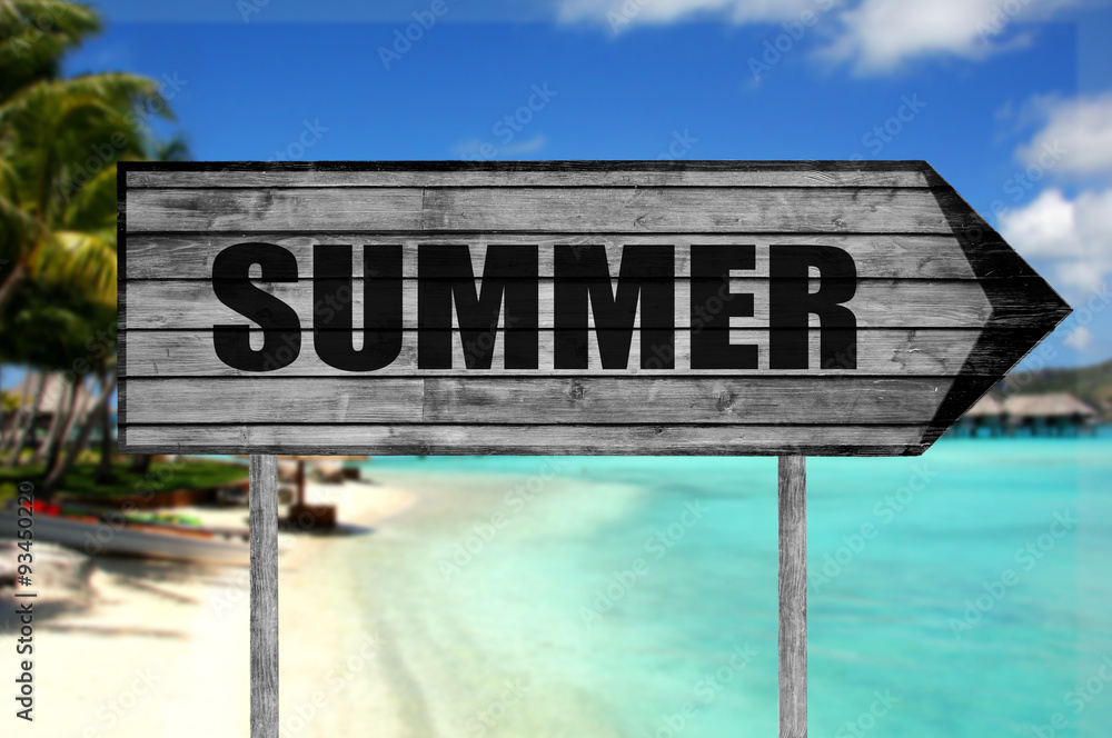 Summer wooden sign with beach background
