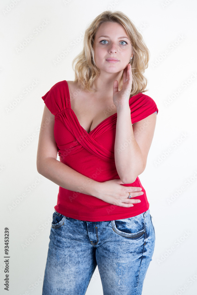 Blond young and pretty girl with a red top Blond young and pretty girl with a red top