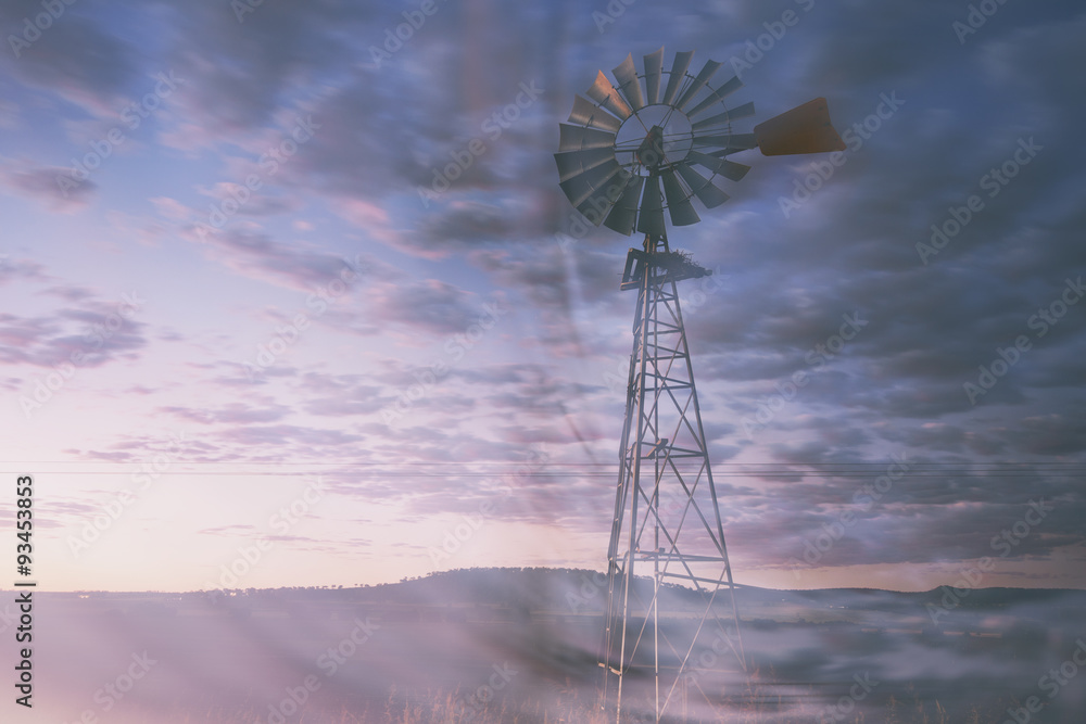 Windmill in the outback of Queensland, Australia. Windmill in the outback of Queensland, Australia.