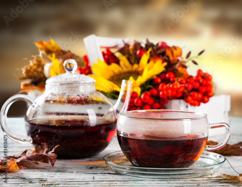 tea composition on a wooden background, autumn concept photo