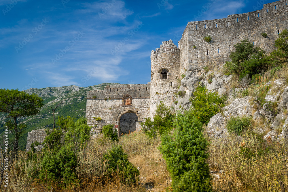 Main gate of abandoned old turkish fortress Haj-Nehaj on the mountain near Sutomore village, Montenegro. 