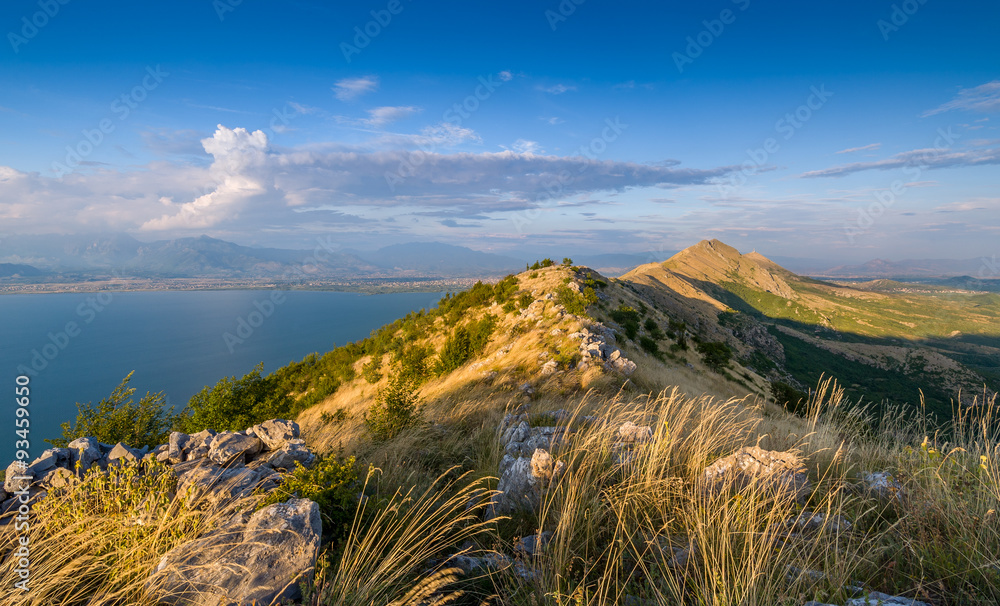 Mountain peak and Skadar lake national park on the Montenegro and Albania border. Montenegro.