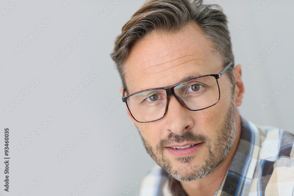 Portrait of handsome 40-year-old man with eyeglasses