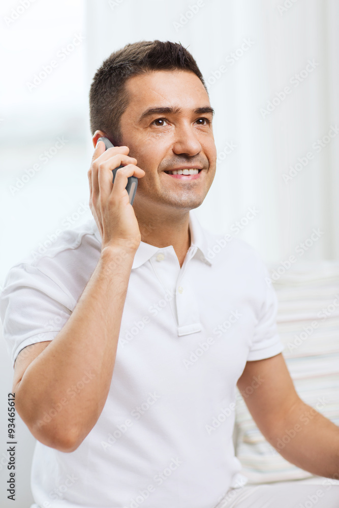 happy man calling on smartphone at home happy man calling on smartphone at home