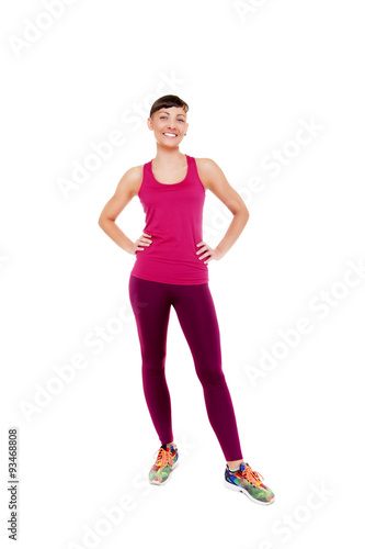Young woman in fitness outfit isoleted on white background smili