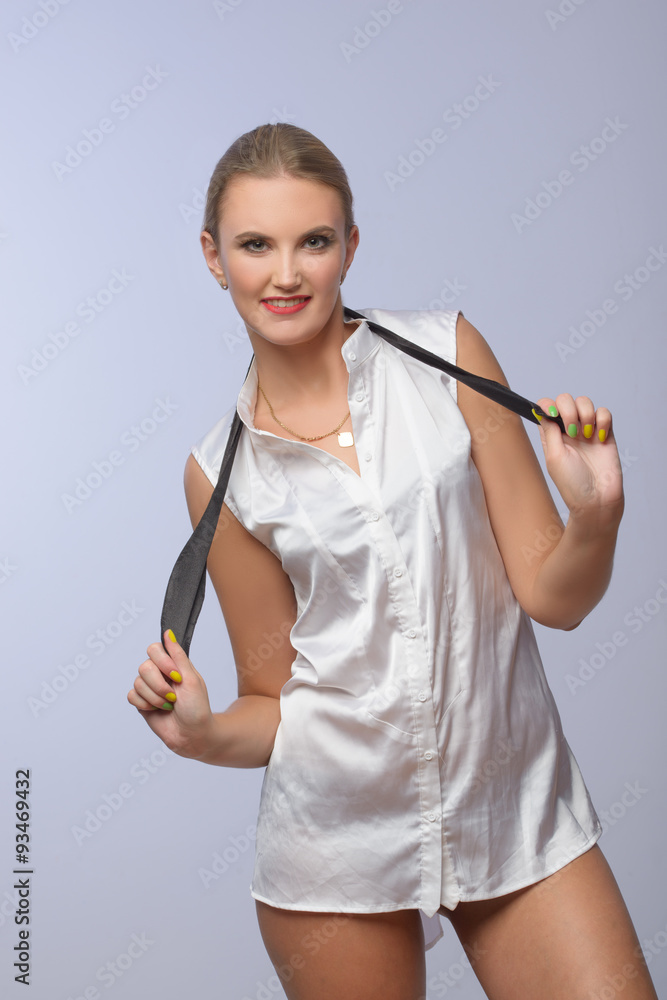 blond woman posing in shirt
