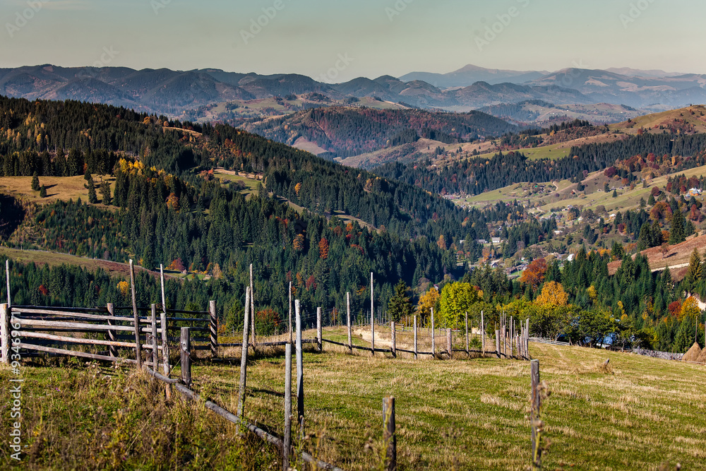 Small village in autumn Carpathian mountains