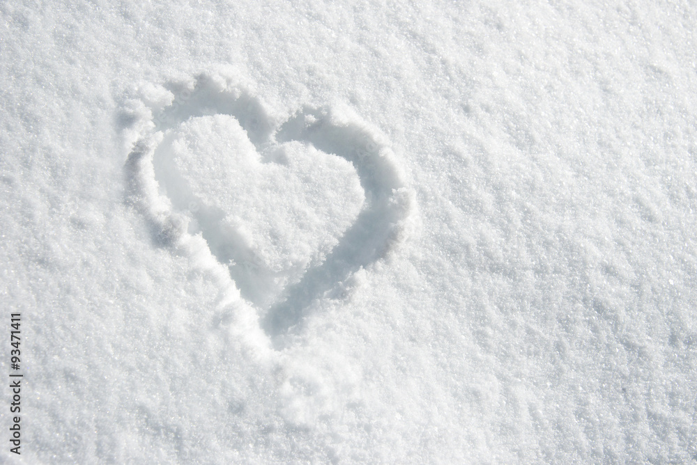 Close up of a heart n the snow Close up of a heart n the snow