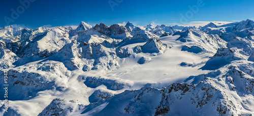 Panorama of Snow Mountain Range. Landscape with Blue Sky at Mt Fort Peak Alps Region Switzerland