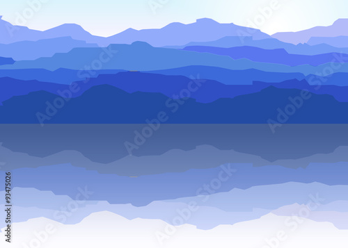 View of blue mountains reflected in the water.Mountain landscape.