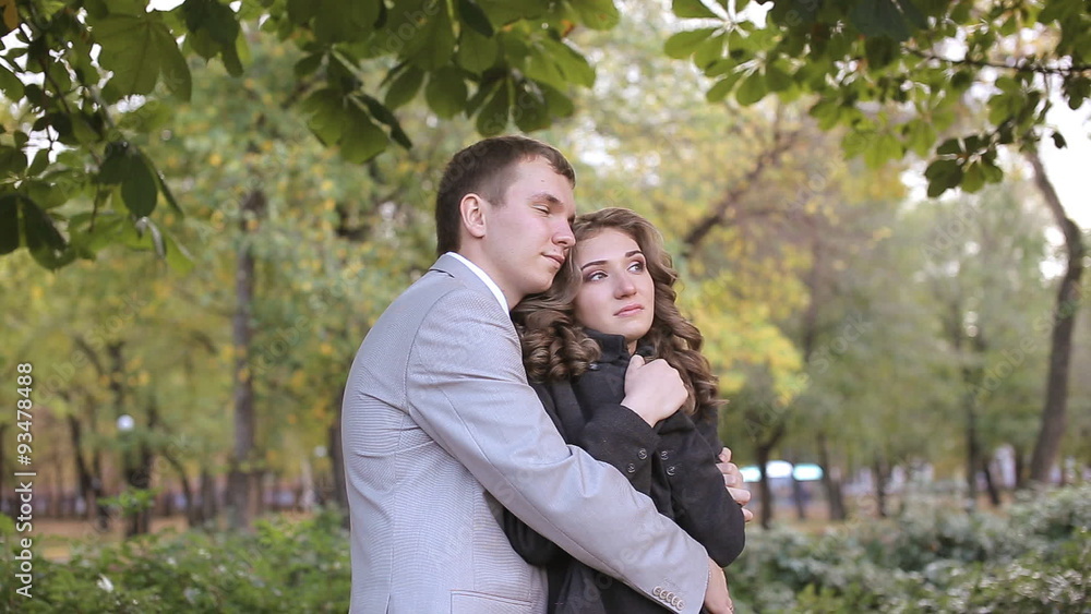 Couple hugging each other and warm in the park Couple hugging each other and warm in the park