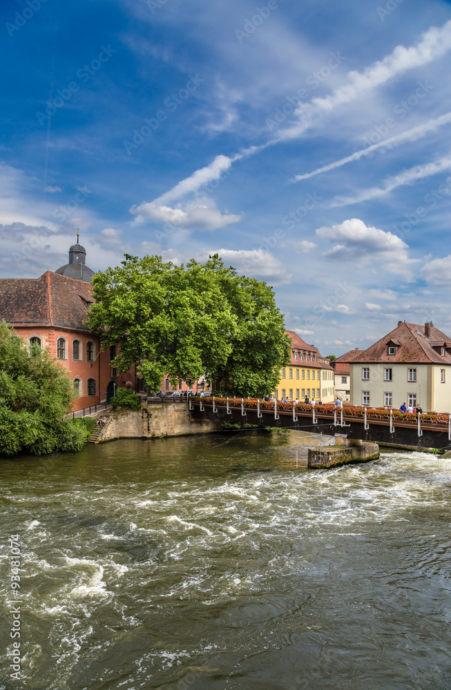 Bamberg, Germany. Scenic view with old buildings on the Regnitz  River. Historic city center of Bamberg is a listed UNESCO world heritage site