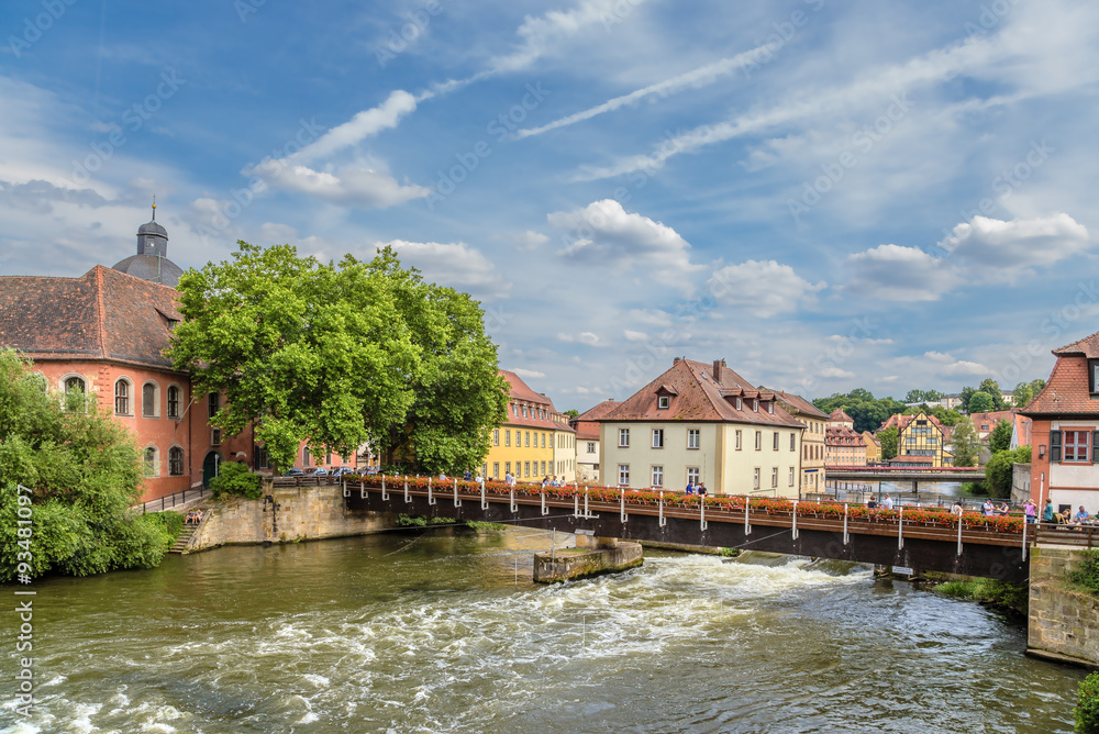 Bamberg, Germany. Scenic view of bridges and old buildings on the banks of the Regnitz river.Historic city center of Bamberg is a listed UNESCO world heritage site