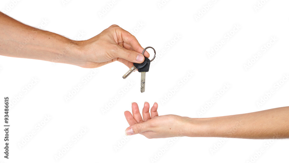 Hand giving a key isolated on white background Hand giving a key isolated on white background