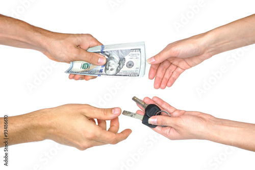 Hand with money and keys, Isolated over white