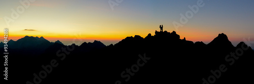 Couple in love in mountains - panorama