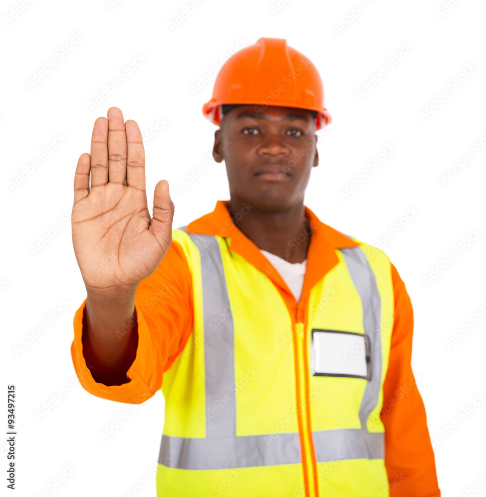 african constructor showing stop gesture african constructor showing stop gesture
