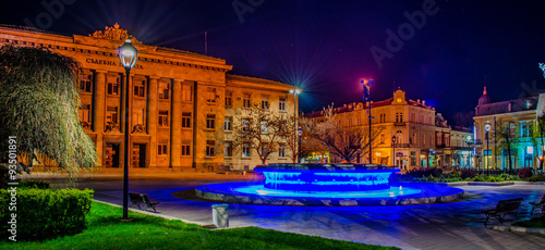 night view of the illuminated building of justice in bulgarian city rousse - ruse. photo