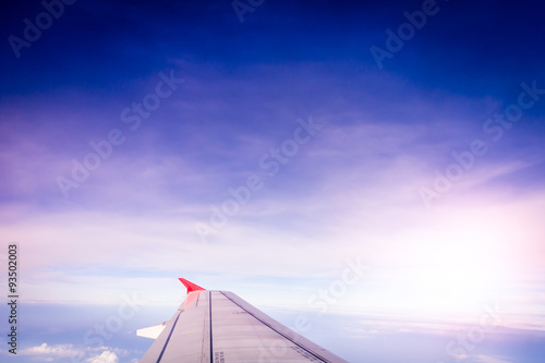 colorful of sky with top view clouds outside the plane.