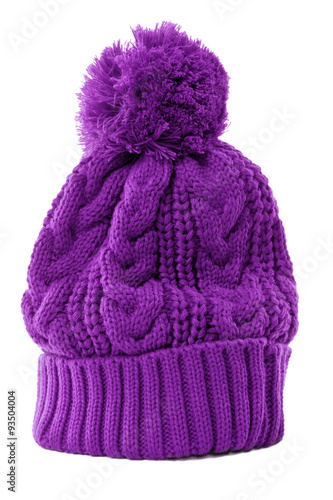 One single purple winter bobble ski knit hat isolated on white background winter clothes