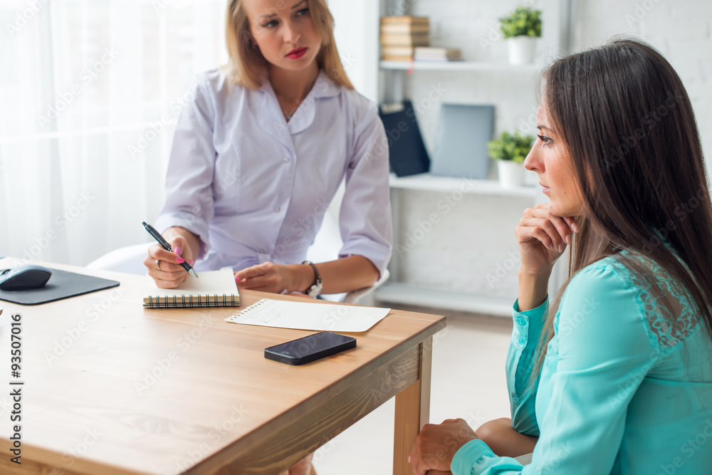 doctor explaining diagnosis to her female patient healthcare and doctor explaining diagnosis to her female patient healthcare and