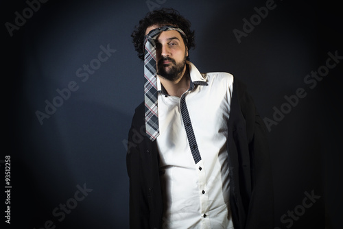 Canvas Print Young man drunk with necktie on head