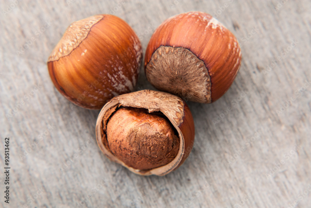 Fine hazelnuts. All on wooden background Fine hazelnuts. All on wooden background