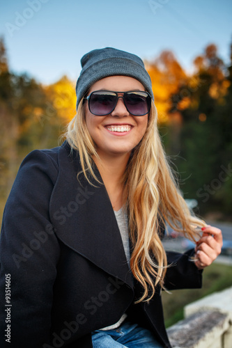 Portrait of smiling blond woman.
