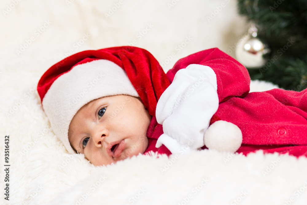 cute baby sleeping in Christmas clothes cute baby sleeping in Christmas clothes