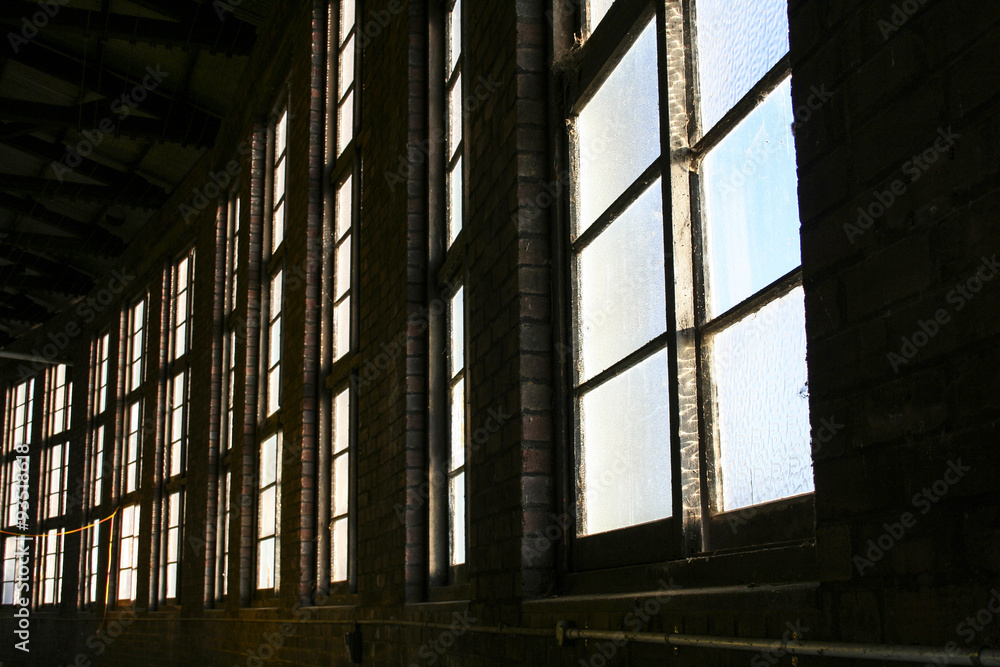 Frosted glass windows in historic train round house building. Frosted glass windows in historic train round house building.