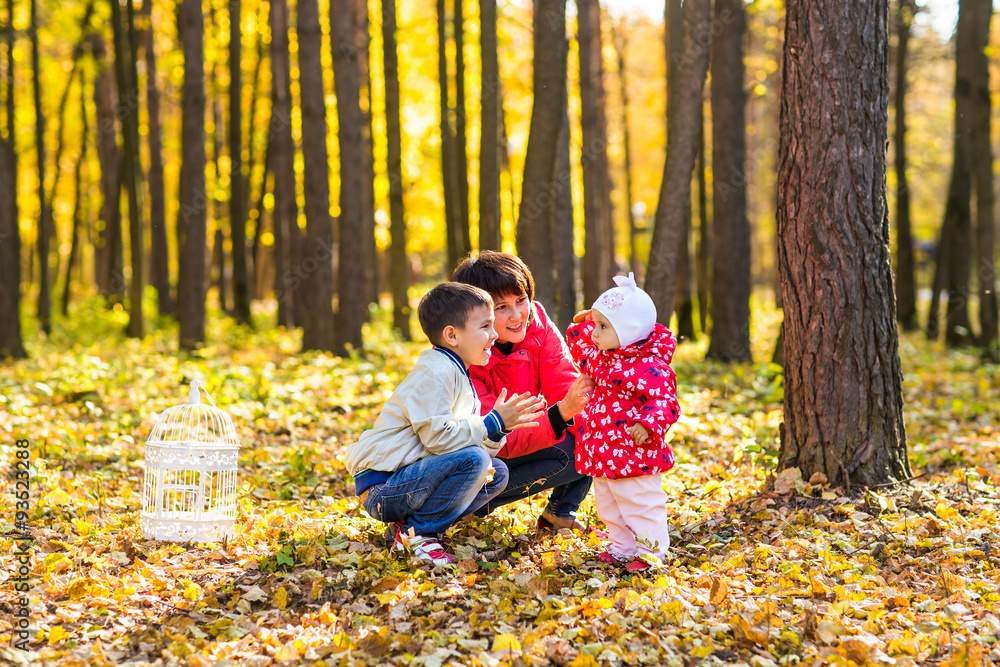 Fototapeta premium Happy family relaxing outdoors In autumn park