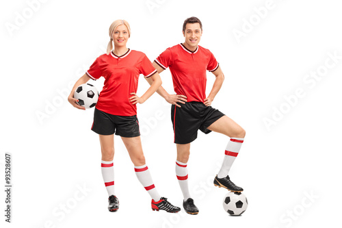 Male and female football players © Ljupco Smokovski