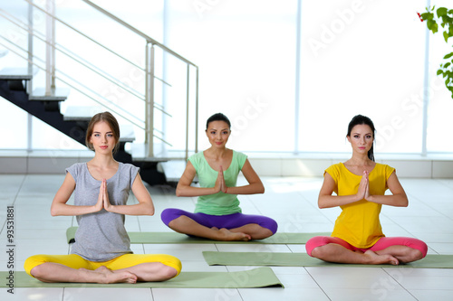 Beautiful young women do yoga