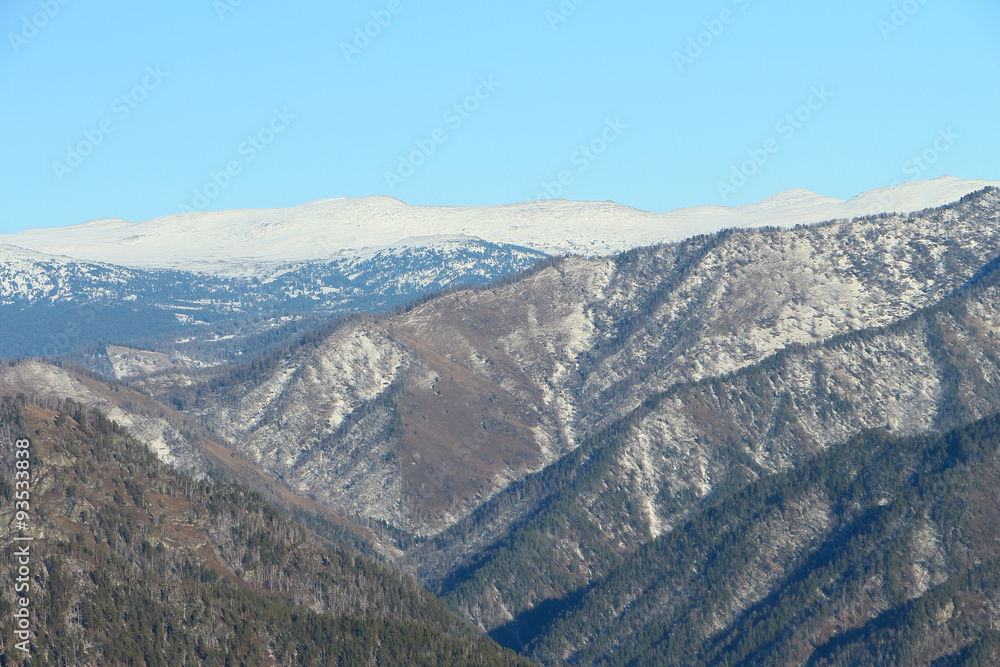 Snow-covered tops of mountains against the blue sky, Mountain Altai, Russia
