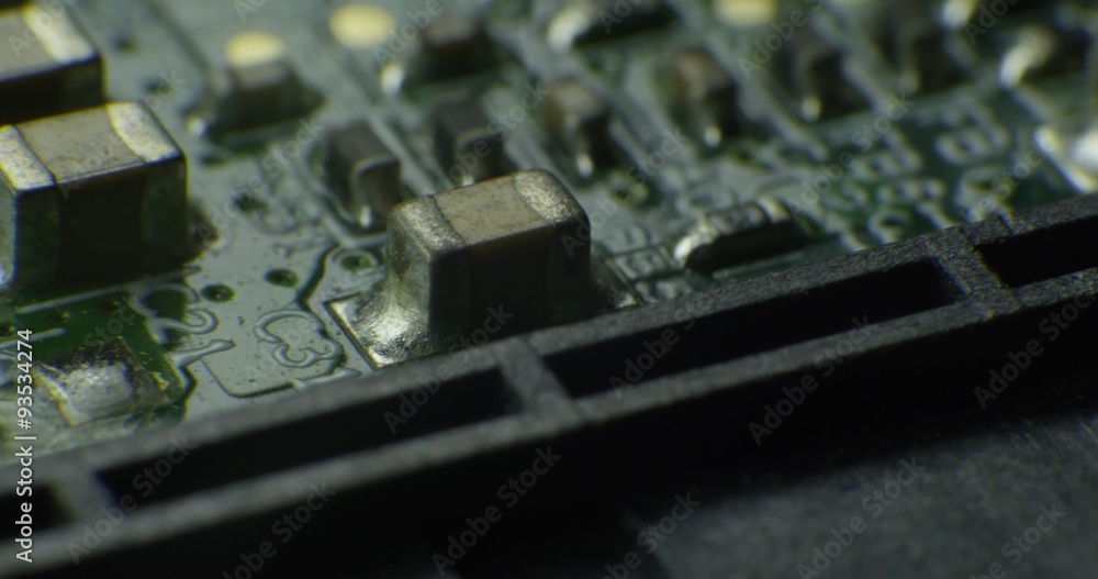 Macro shot on technology circuit board rotating. 4K Macro shot on technology circuit board rotating. 4K