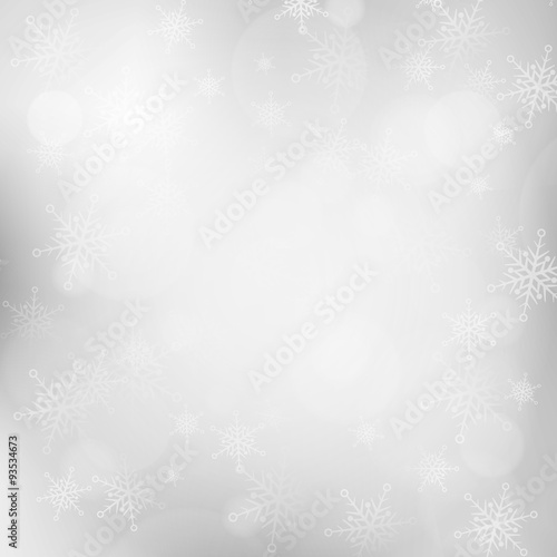Christmas silver blurred background with snowflakes