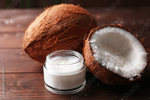 Canvas Print Spa coconut products on dark wooden background